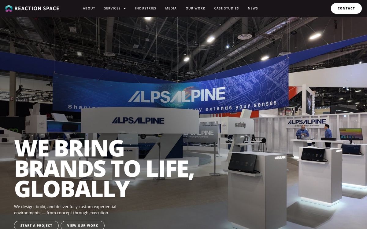 Reaction Space homepage on desktop: full-bleed trade show booth photo under the headline We Bring Brands to Life, Globally
